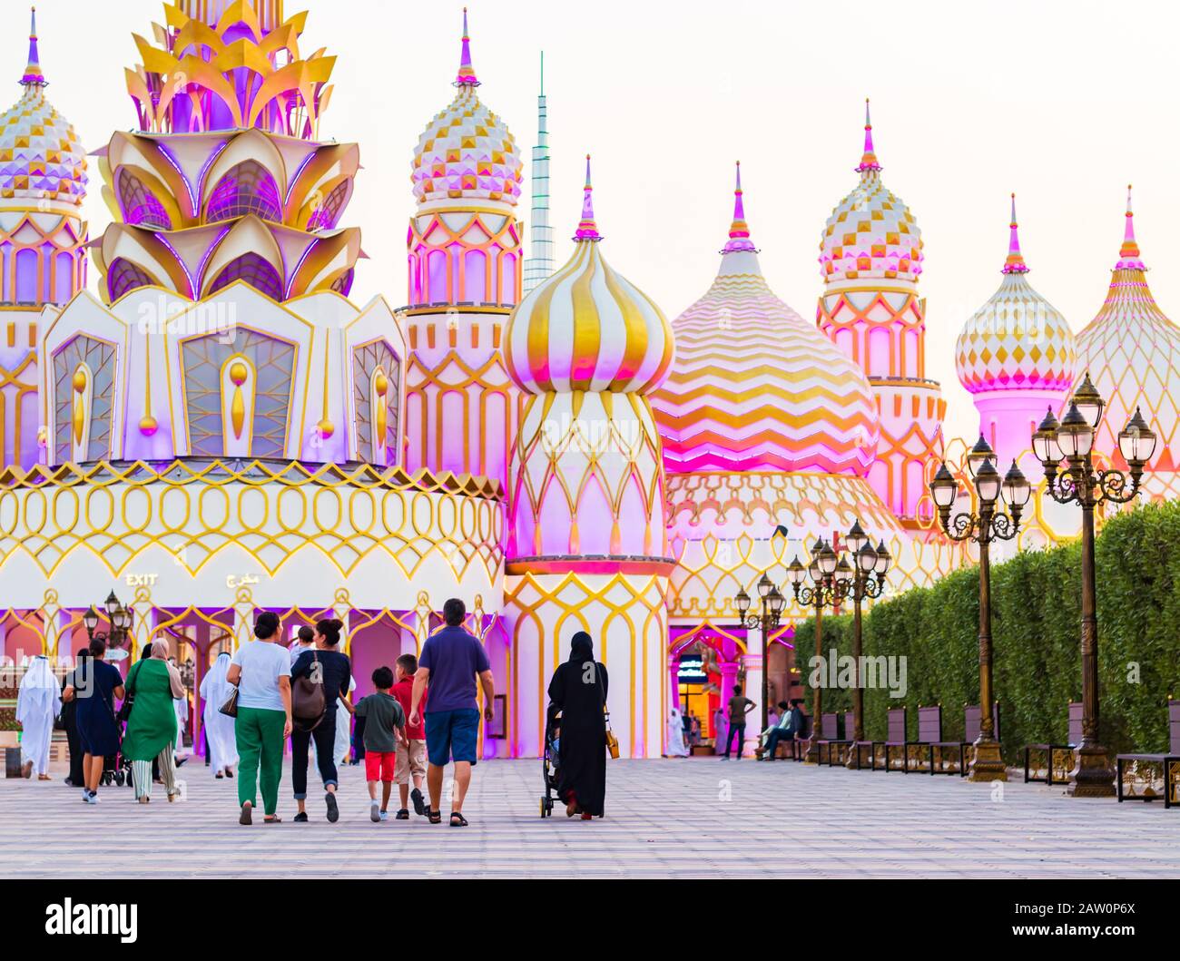 visitors walking towards the Global village in Dubai, the United Arab Emirates at the evening Stock Photo