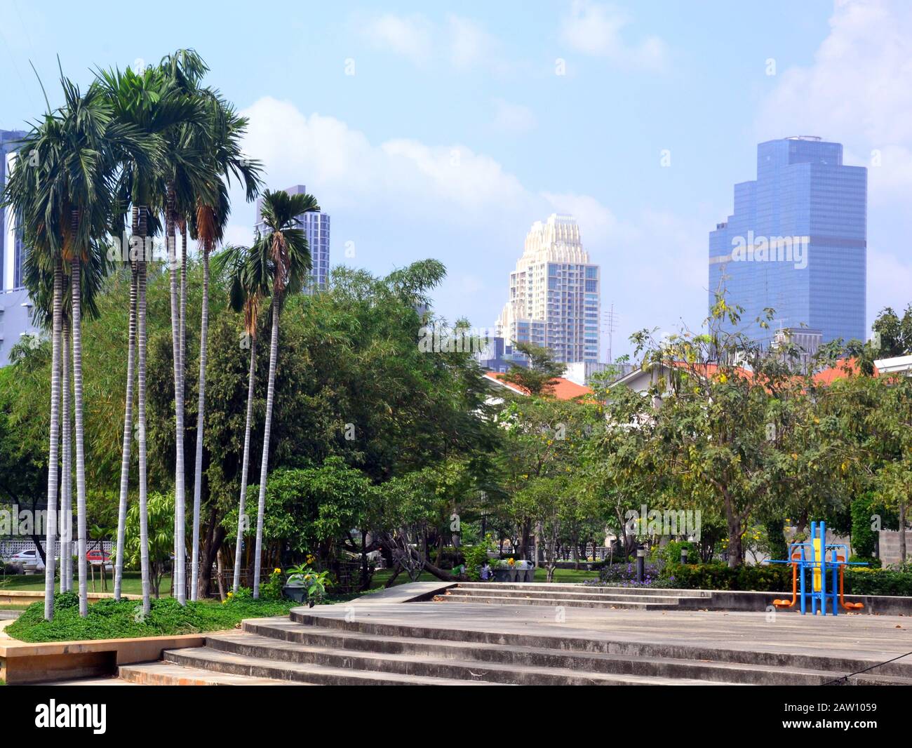 Suan Plu park, central Bangkok, Thailand, Asia, with skyscrapers in the background Stock Photo