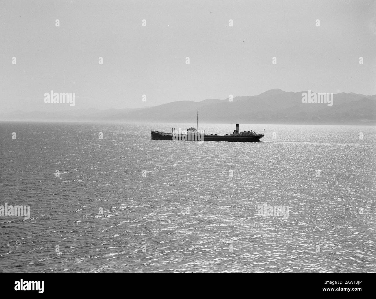 Aboard the MS Dempo  Meeting with Ann tank boat in the Strait of Messina Date: 1935 Location: Italy, Messina Keywords: ships, seas Stock Photo