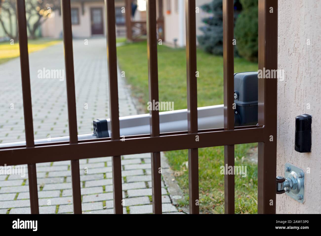 Picture of an automatic door gate with motor Stock Photo Alamy