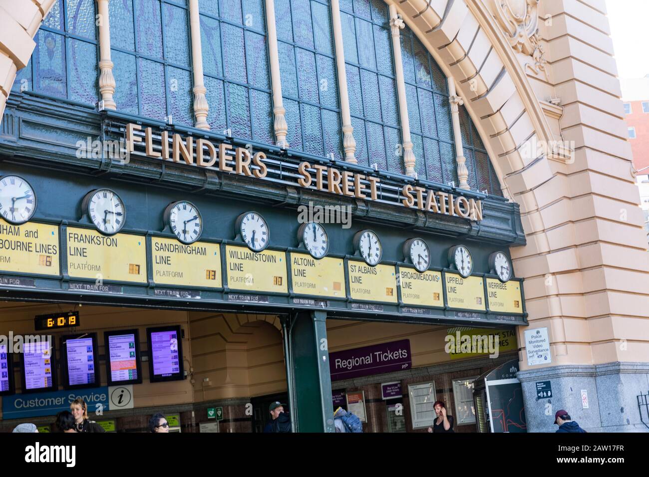 Flinders street railway station with time clocks in Melbourne city