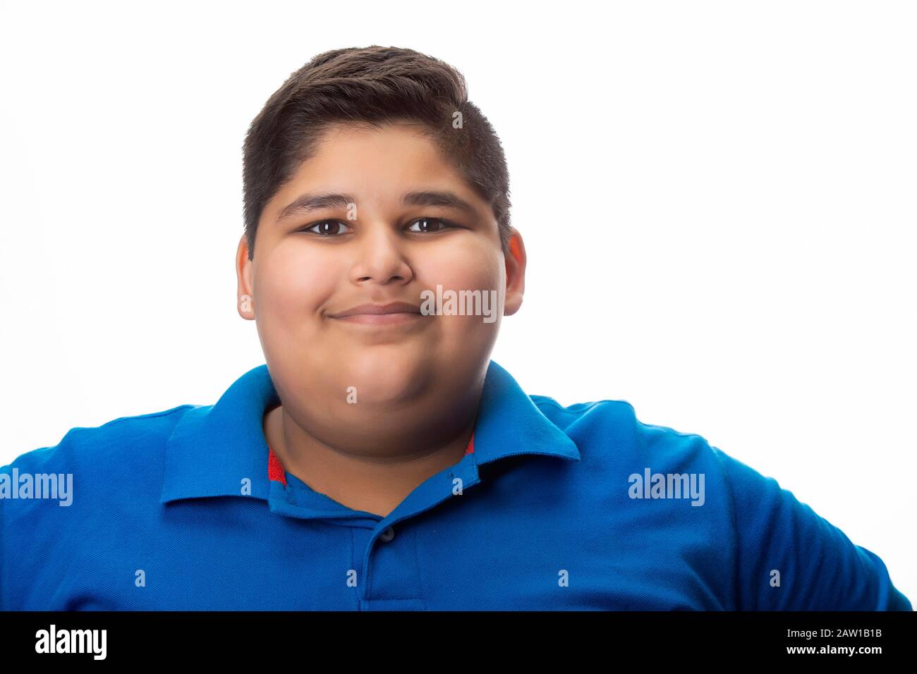Portrait of a chubby boy smiling. (Obesity) Stock Photo