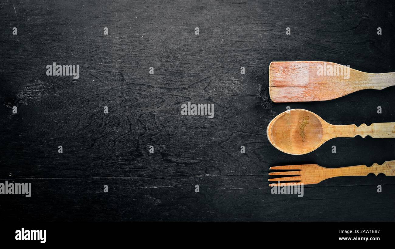 Kitchen tools. On Wooden background. Top view. Stock Photo