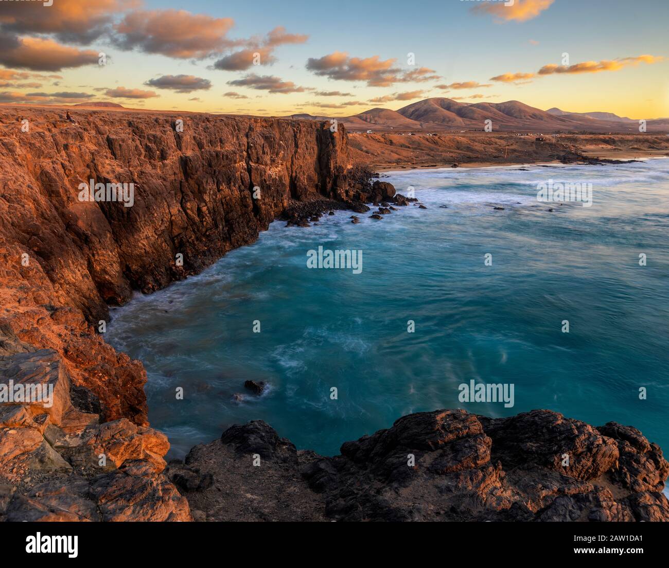 Beautiful sunset on a cliff in Fuerteventura Stock Photo - Alamy