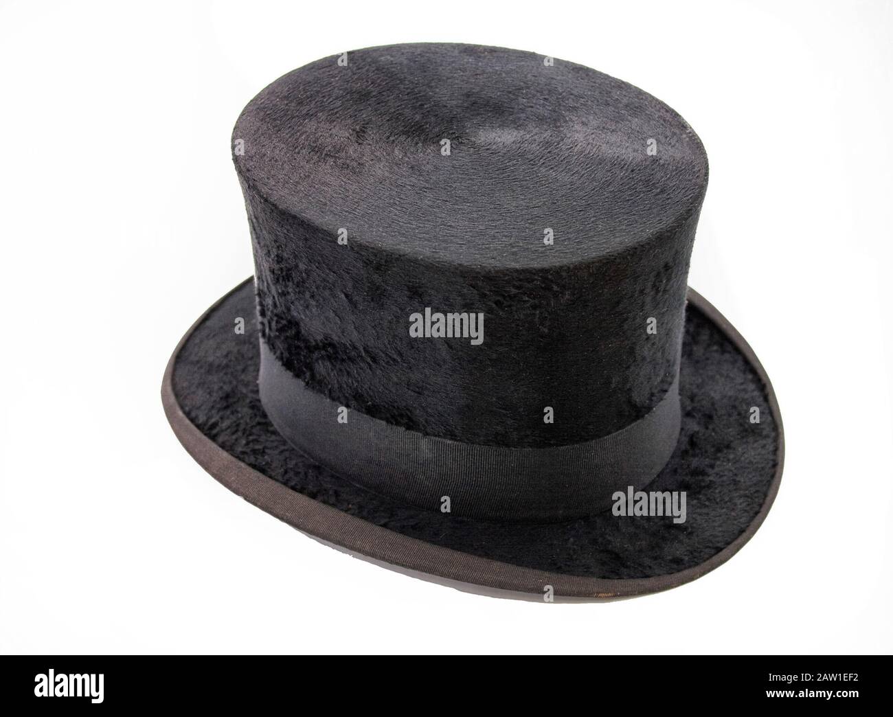 Black top hat isolated on white Stock Photo - Alamy