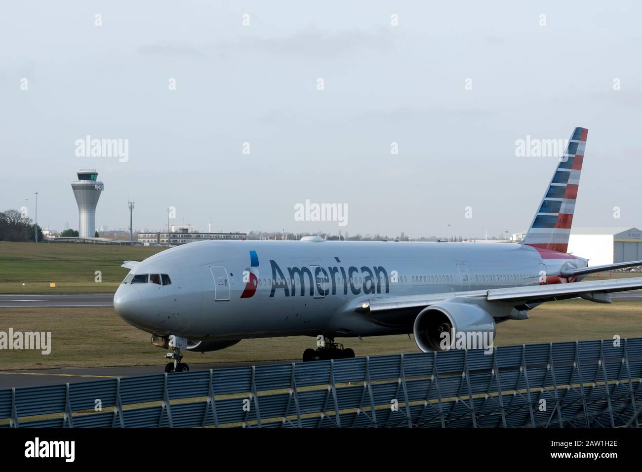 American Airlines Boeing 777-223 taxiing at Birmingham Airport, UK (N775AN) Stock Photo