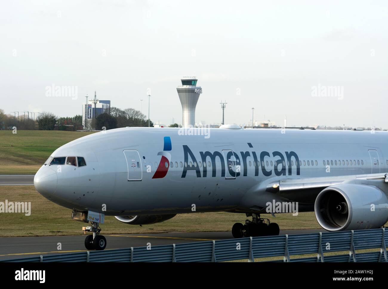 American Airlines Boeing 777-223 taxiing at Birmingham Airport, UK (N775AN) Stock Photo