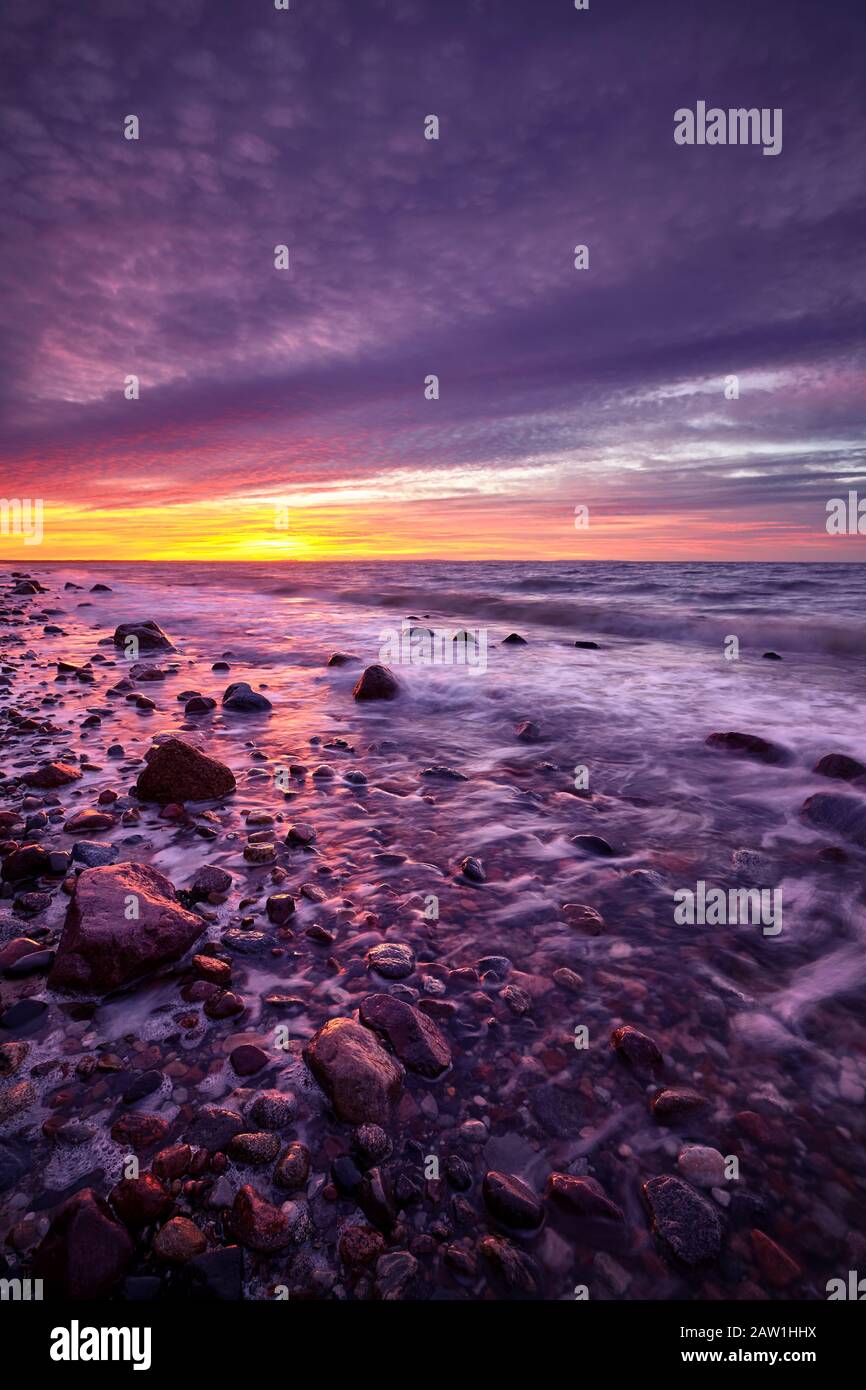 Purple sunset over beautiful beach in Wolin National Park, Poland. Stock Photo