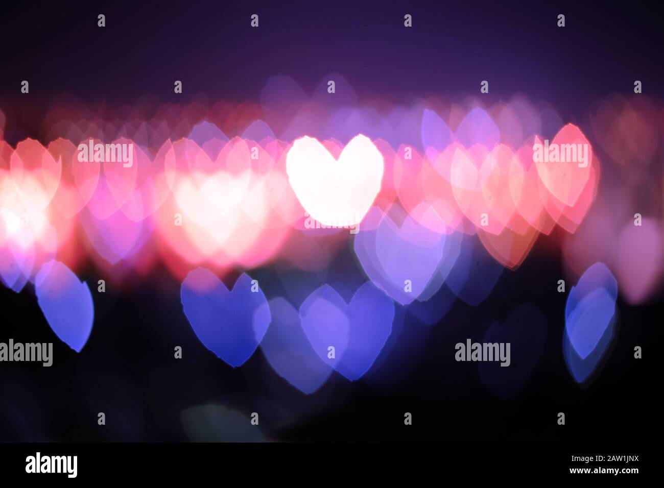 Abstract blurred heart bokeh lights backgrounds, Colorful blurred bokeh of  city night light Stock Photo - Alamy