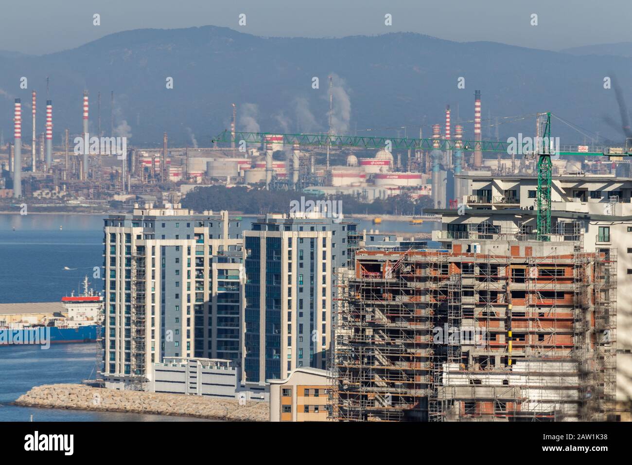 Construction works in Gibraltar and, in the background, the polluted
