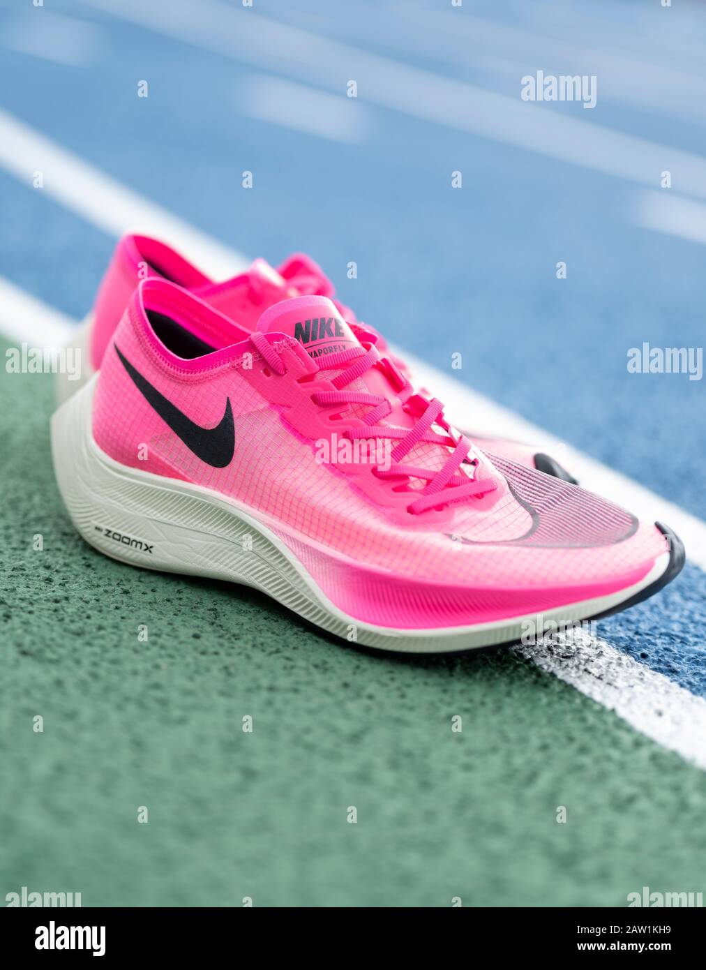 Nike ZoomX Vaporfly Next running shoe in pink Pink Blast Guava Ice Black record breaking shoe carbon aero Stock Photo Alamy