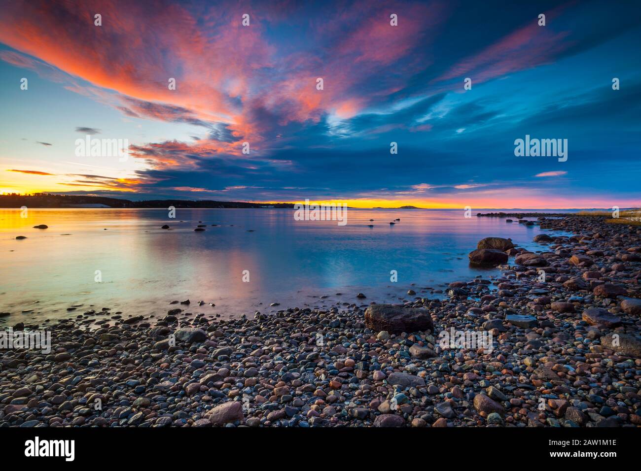 Colorful sunrise by the Oslofjord at the island Jeløy, Moss kommune, Østfold, Norway. Stock Photo