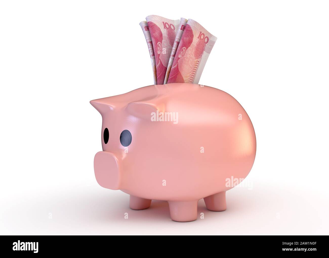 A pink piggy bank with a rolled up pair of china yuan bank notes ...