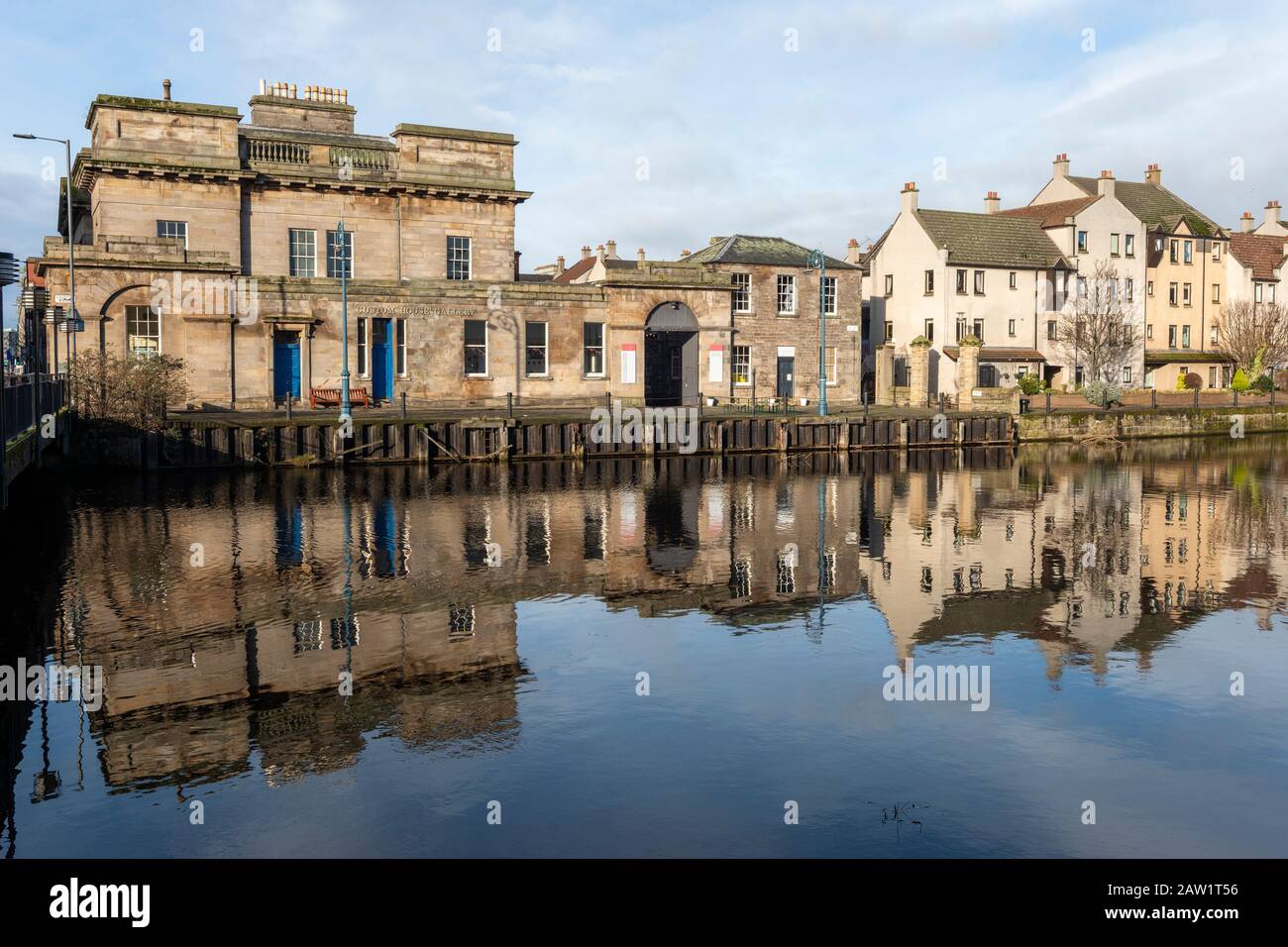 Custom House Gallery on Customs Wharf reflected in the Water of Leith in Leith, Edinburgh, Scotland, United Kingdom Stock Photo