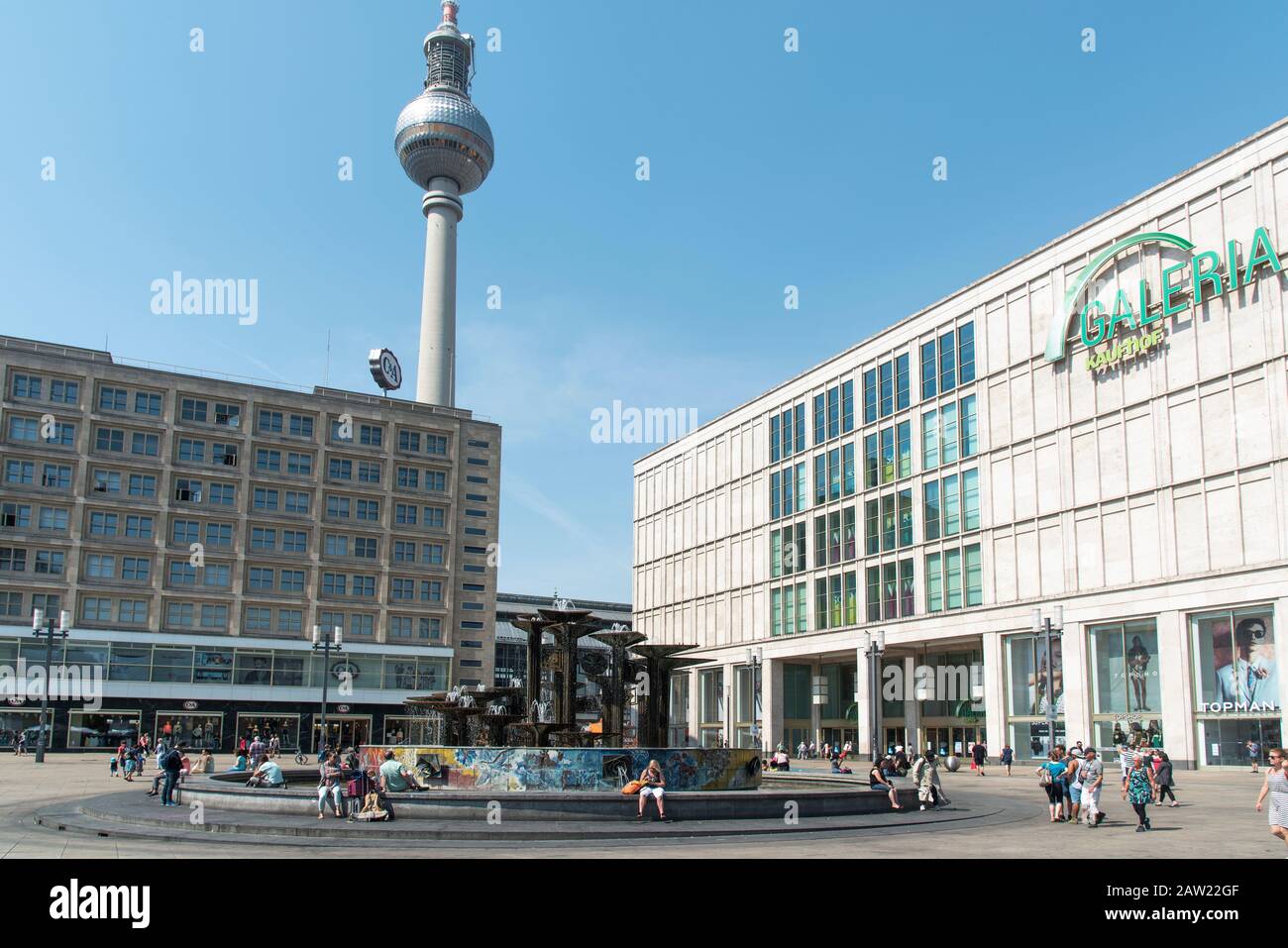 BERLIN, GERMANY - MAY 28, 2018: A view of the Alexanderplatz square, with the Brunnen der Volkerfreundschaft fountain in the center and the popular Te Stock Photo