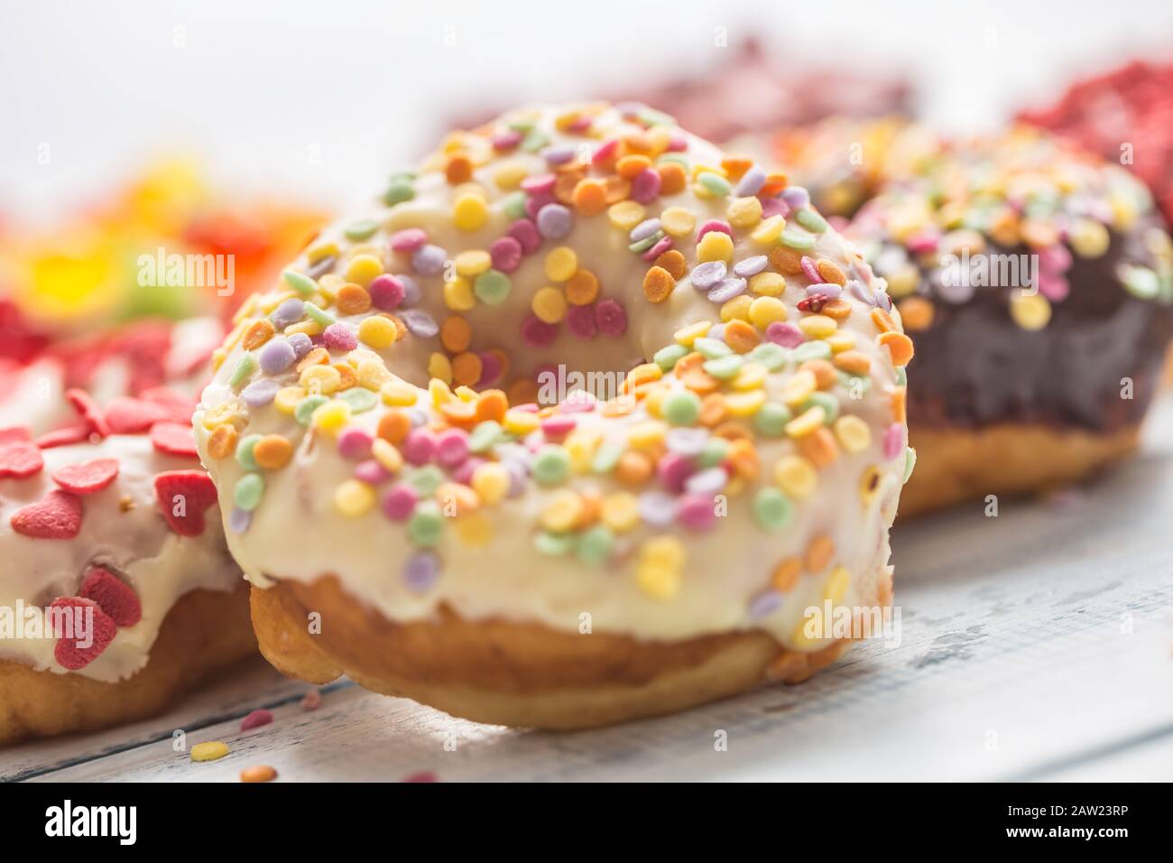 Assorted colorful donuts close hi-res stock photography and images - Alamy