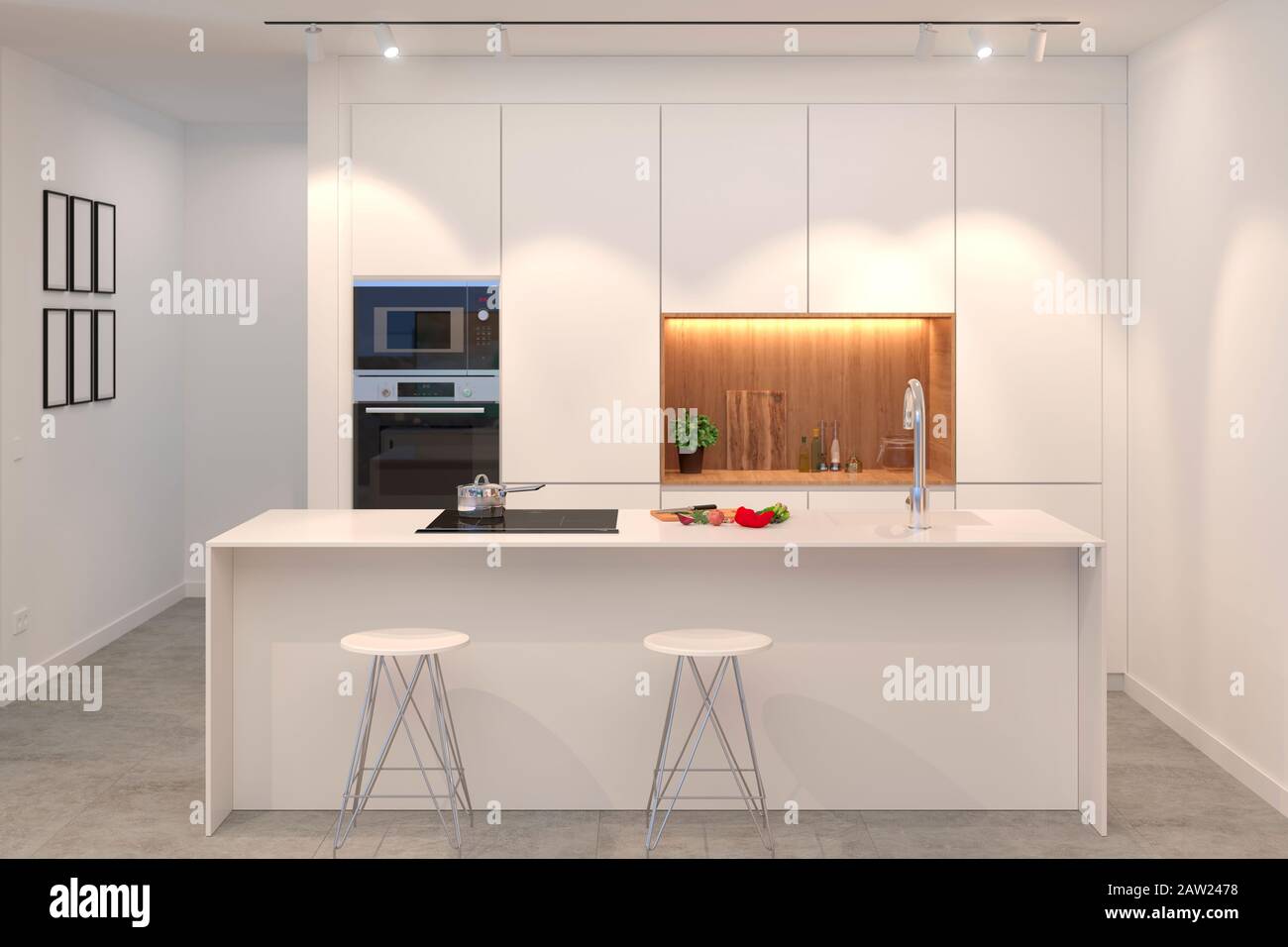 frontal view of interior design of clean modern white kitchen with island Stock Photo