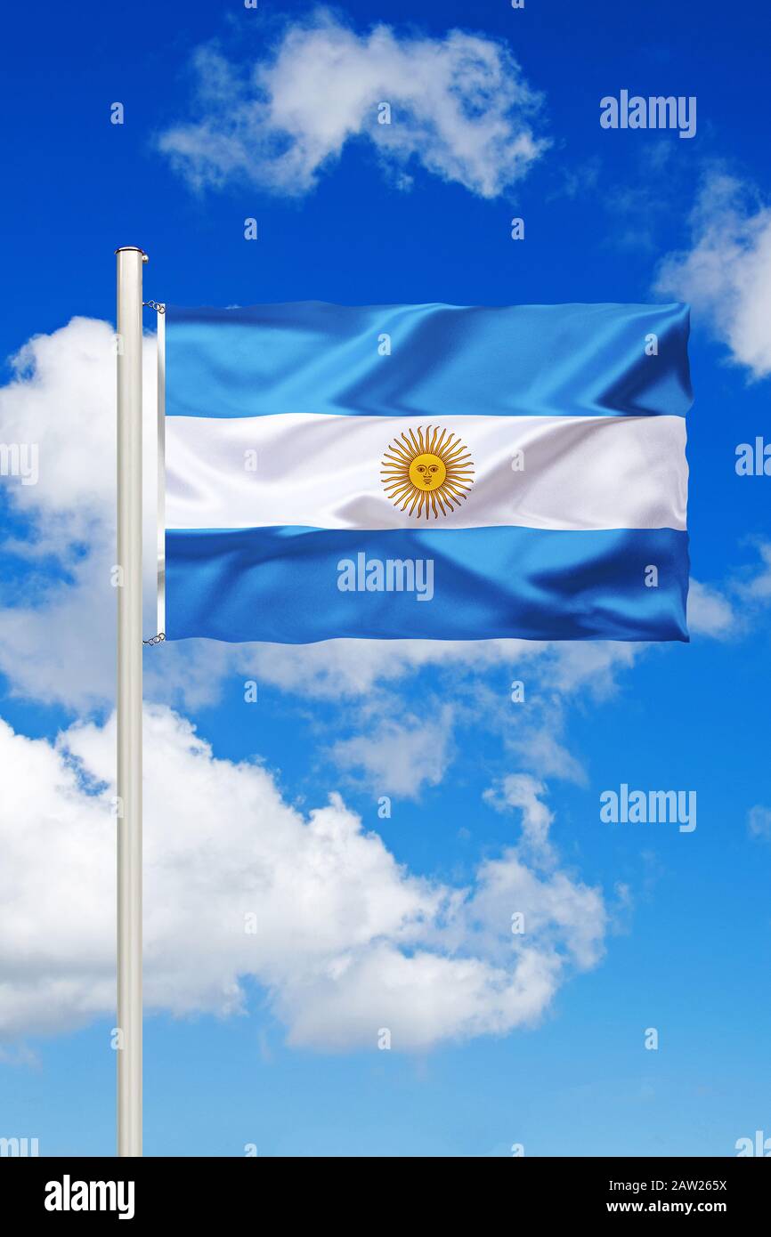 flag of Argentina in front of blue cloudy sky, Argentina Stock Photo