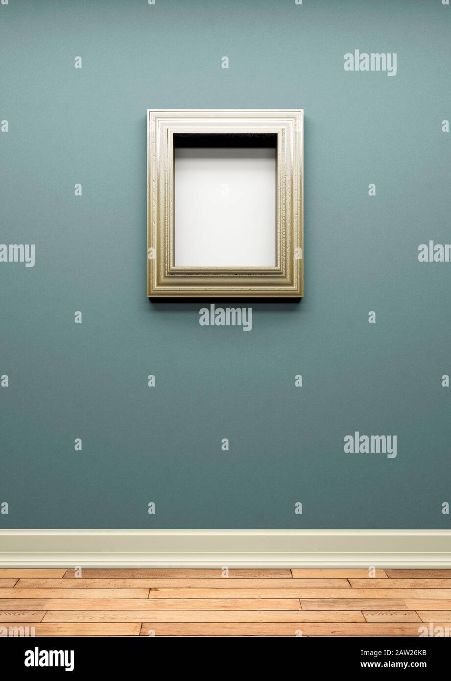 Thick blank metallic picture frame on a blue wall Stock Photo