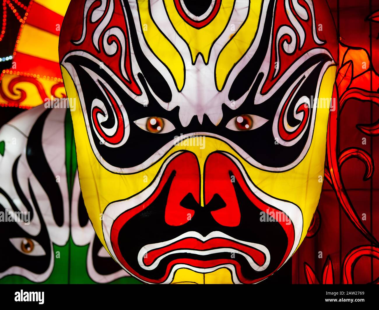 Chinese Lantern Mask With Yellow, Red, Black, Green and White Stock Photo