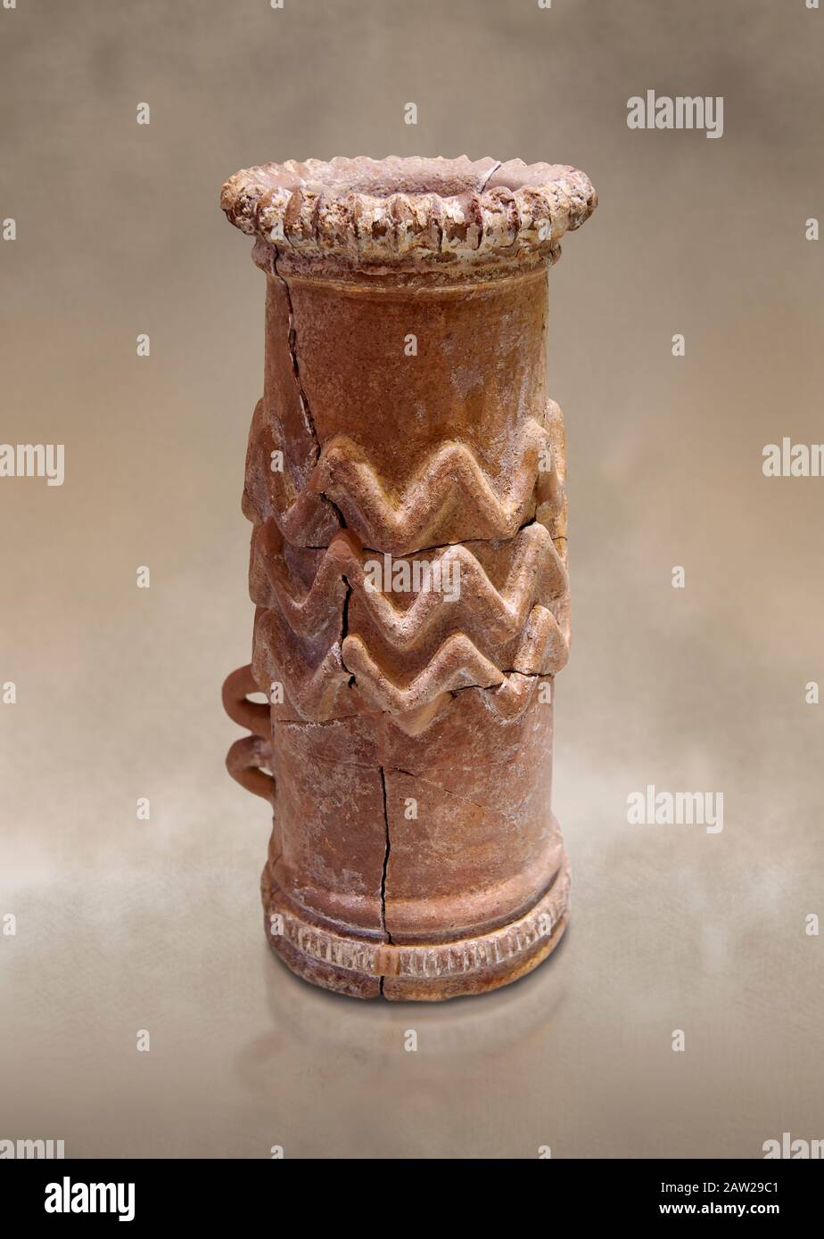 Minoan cylindrical cult vessel base used to support vessels full of offerings ,  1300-1100 BC,  Heraklion Archaeological  Museum .  These cylindrical Stock Photo