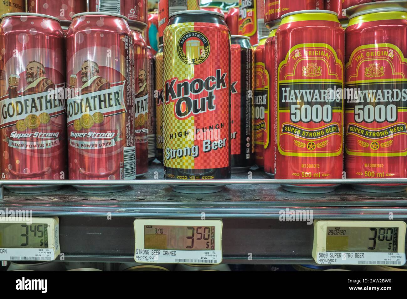 Brands of Indian strong beer in a supermarket in Singapore: the promisingly named 'Knock Out (High Punch)', and Haywards 5000 and Godfather Stock Photo