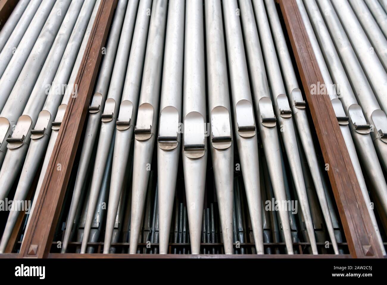 close view of great organ metallic pipes Stock Photo