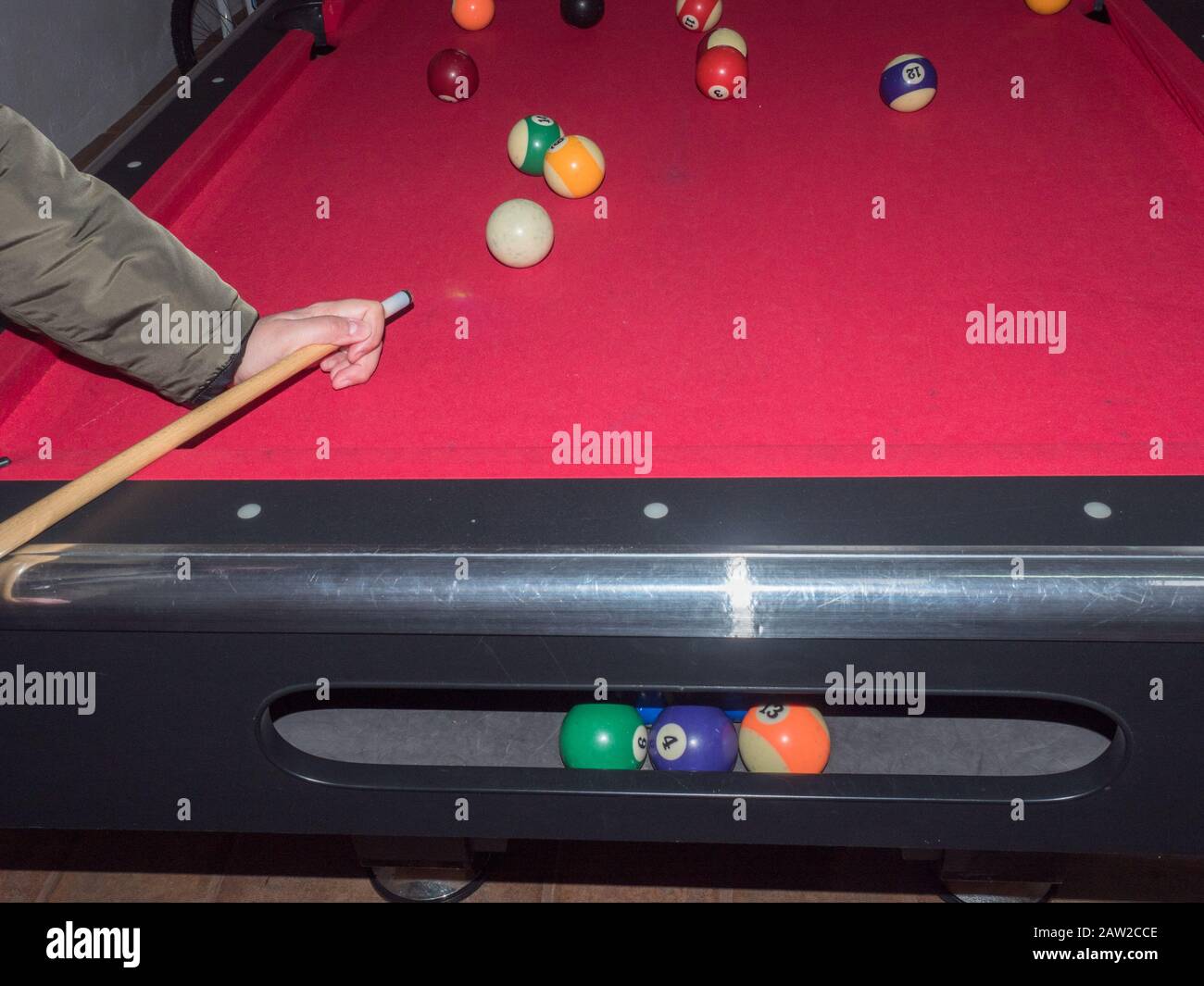 Game of american billiards played on a billiard table for two persons