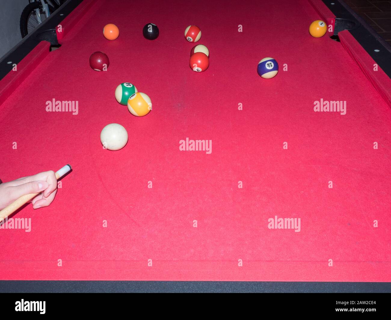 Game of american billiards played on a billiard table for two persons