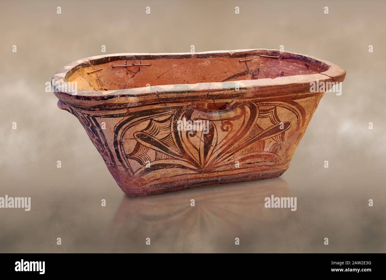 Minoan  pottery bath tub larnax decorated with a stylised crocus flower ,  Episkopi-Lerapetra 1350-1250 BC, Heraklion Archaeological  Museum.  To the Stock Photo