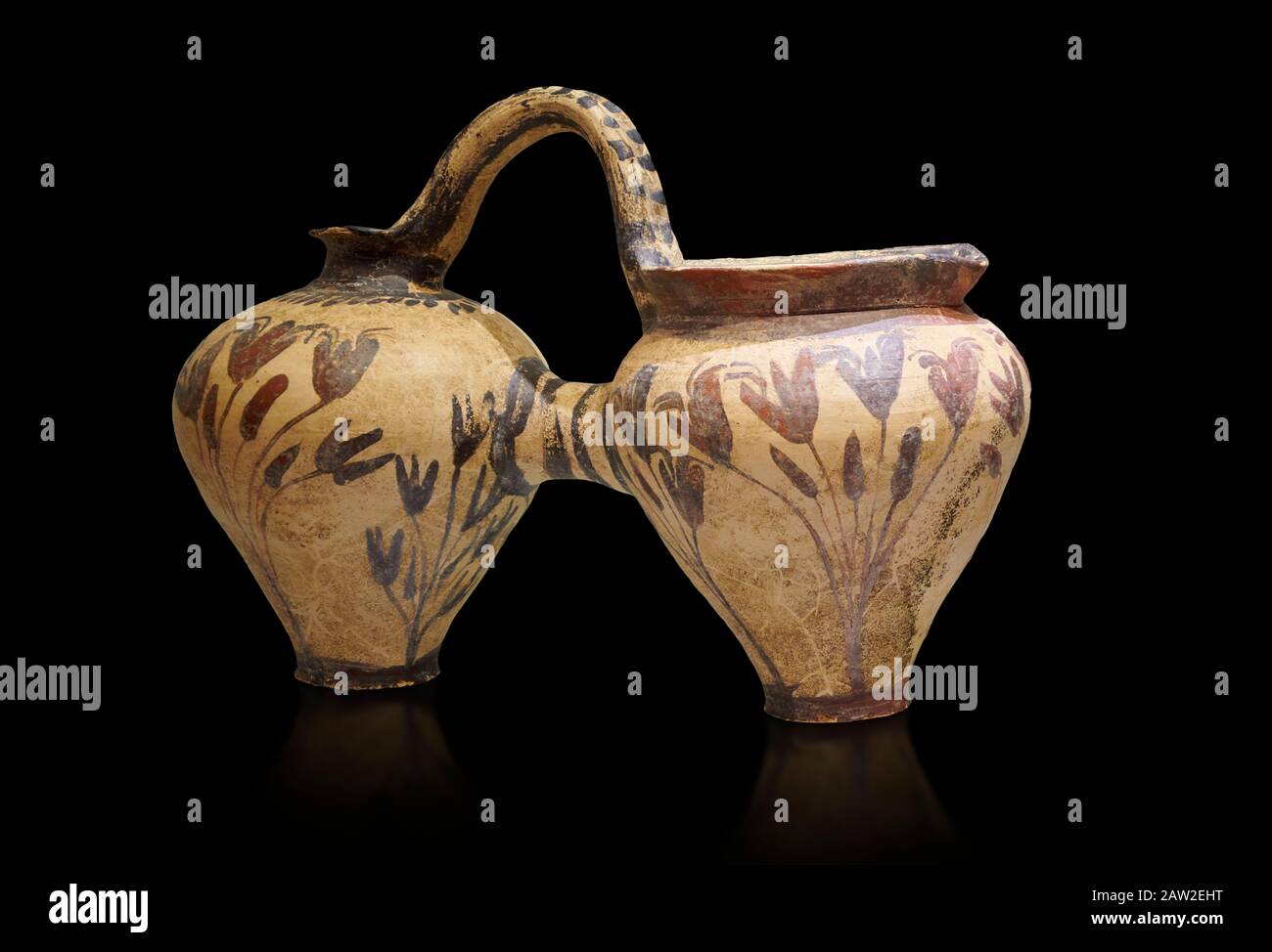 Minoan decorated double ewer with crocus flower  design,  Poros Heraklion 1800-1650 BC;  Heraklion Archaeological  Museum, black background. Stock Photo