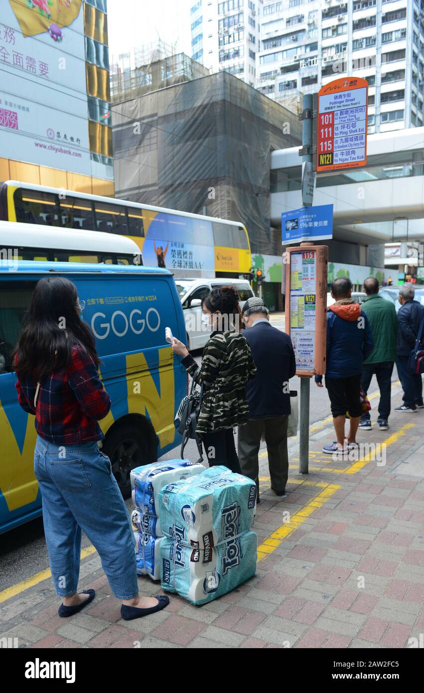 Hong Kongers wearing surgical masks during t he Wuhan Corona Virus epidemic. Stock Photo