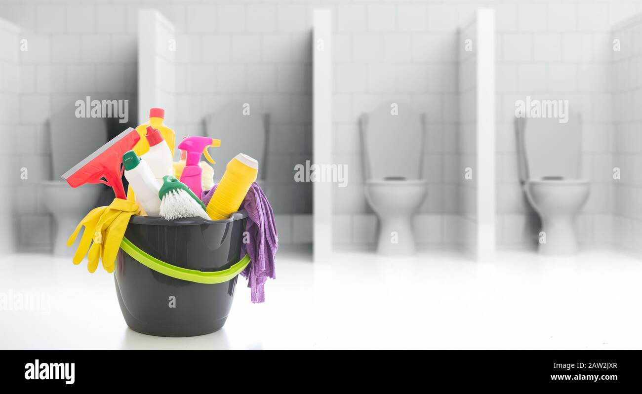 Cleaning products against blur wc toilets background. Plastic chemical detergent bottles and equipment, Business professional sanitary wet area cleani Stock Photo