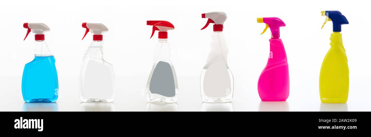 Cleaning spray bottles isolated against white background. Chemical detergents products set, Domestic household collage or business sanitary cleaning Stock Photo