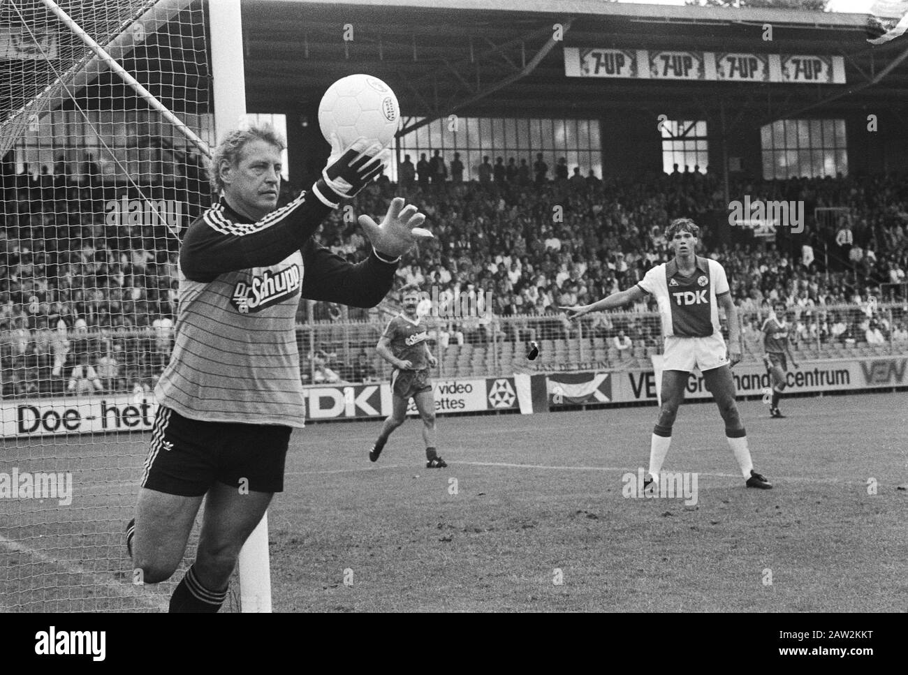 Ajax against PEC Zwolle  Piet Writers keeper PEC Zwolle Annotation: Right Marco van Basten (Ajax). Ajax won 4-2 Date: August 28, 1983 Location: Amsterdam, Noord-Holland Keywords: soccer, sports Person Name: Writers, Piet Institution Name: PEC Zwolle Stock Photo