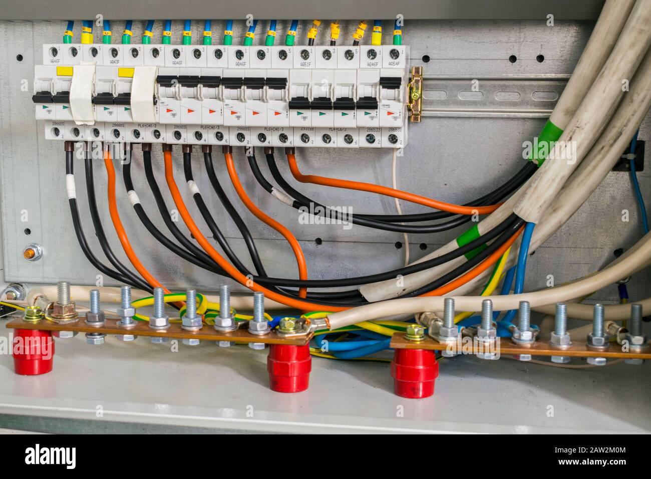 Contacts, terminals and automatic circuit breaker are located in the