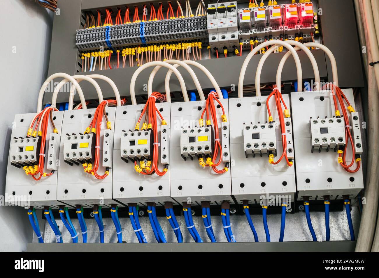 A modern open fuse box contains a lot of automata, connectors, relays