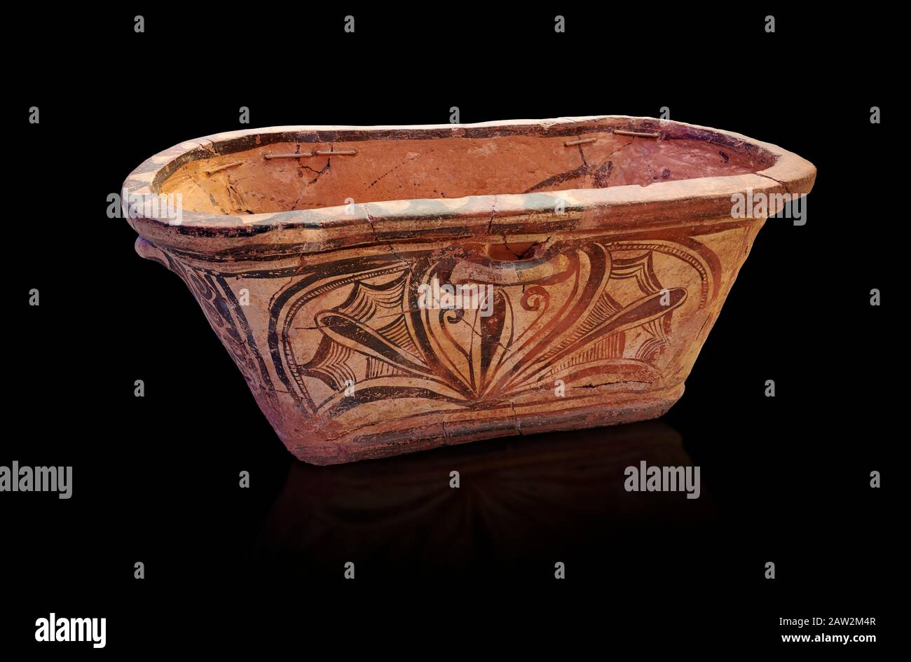 Minoan  pottery bath tub larnax decorated with a stylised crocus flower ,  Episkopi-Lerapetra 1350-1250 BC, Heraklion Archaeological  Museum, black ba Stock Photo
