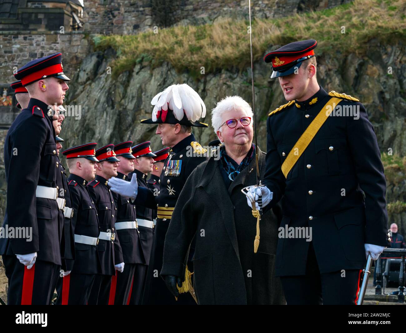 Edinburgh Castle, Edinburgh, Scotland, United Kingdom, 06 February 2020. 21 Gun Salute: The salute by the 26 Regiment Royal Artillery marks the occasion of the Queen’s accession to the throne on 6th February 1952. Val McDermid, Scottish crime writer inspects the regiment marking 20 years since the LGBT ban in the British Army was lifted Stock Photo