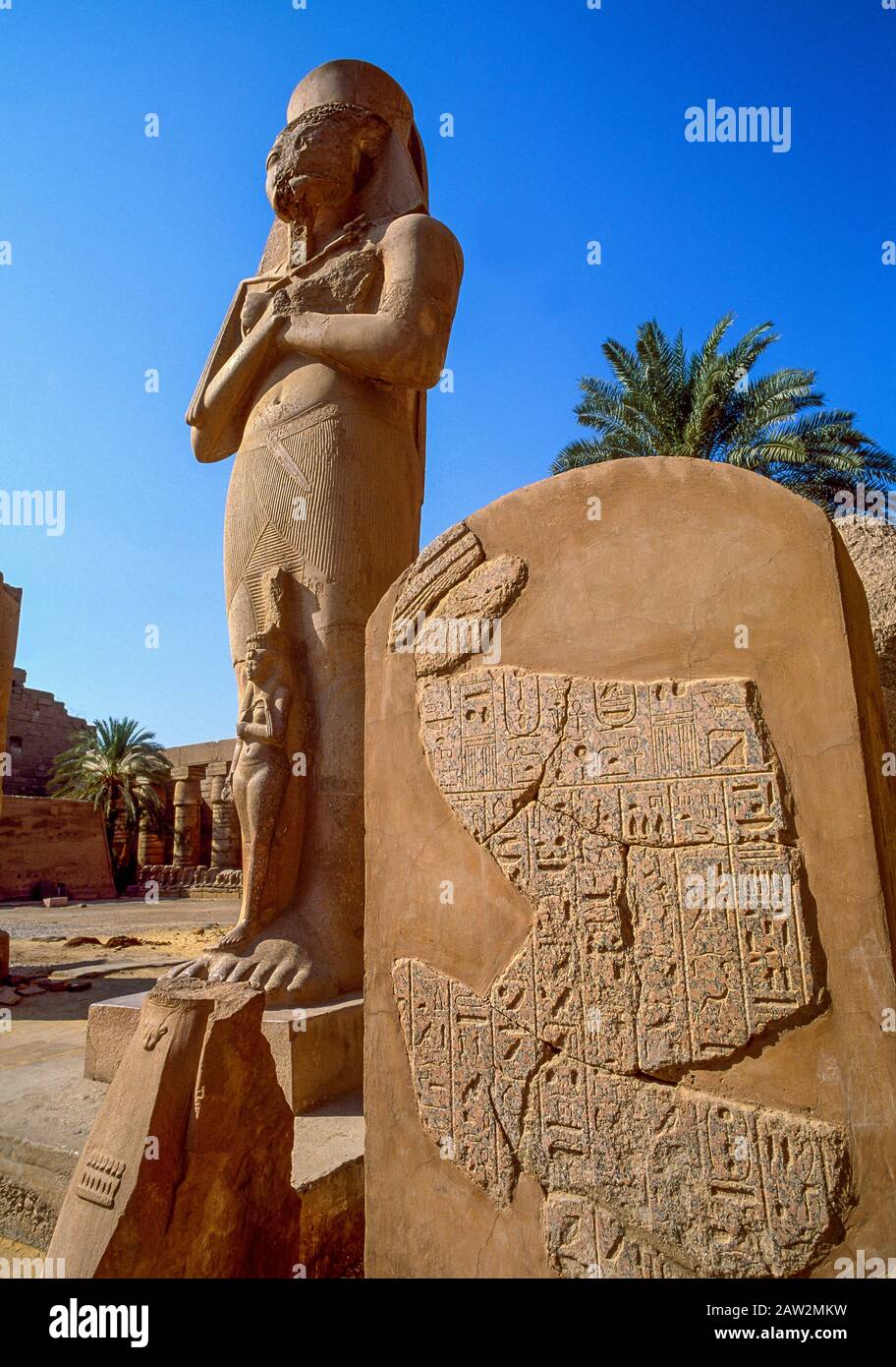 Statue of Ramesses II and Queen Nefertari, Temple of Karnak, Luxor, Egypt Stock Photo