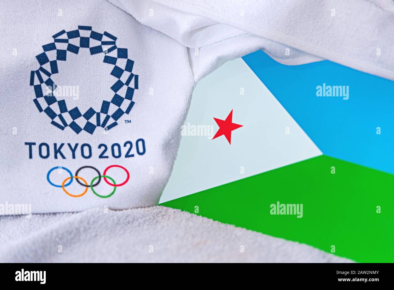 TOKYO, JAPAN, FEBRUARY. 4, 2020: Djibouti National flag, official logo of summer olympic games in Tokyo 2020. White background Stock Photo