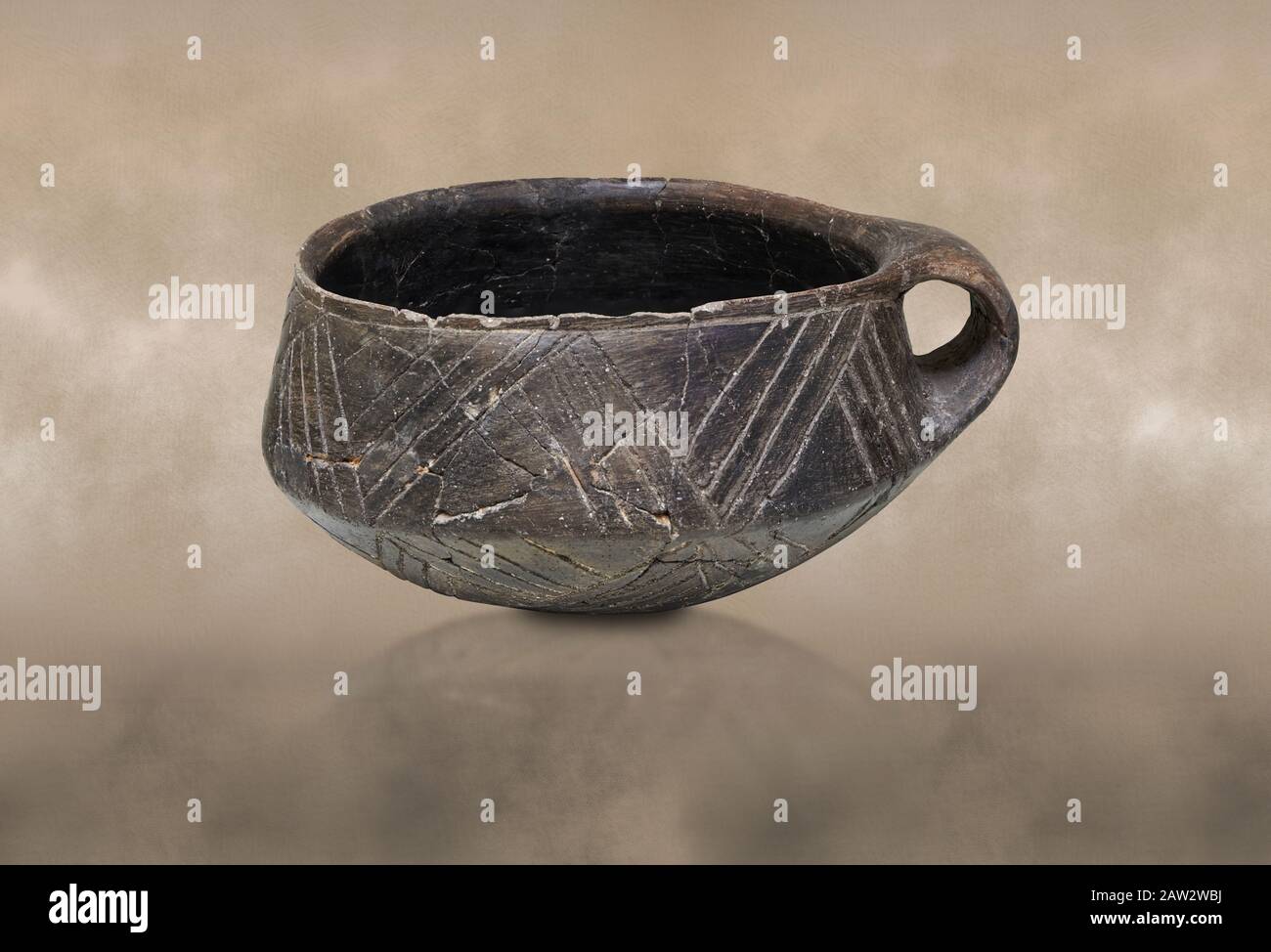 Neolithic Cretian clay single handled cup open kiln fired at Knossos,  4500-3000 BC, Heraklion Archaeological  Museum. Stock Photo