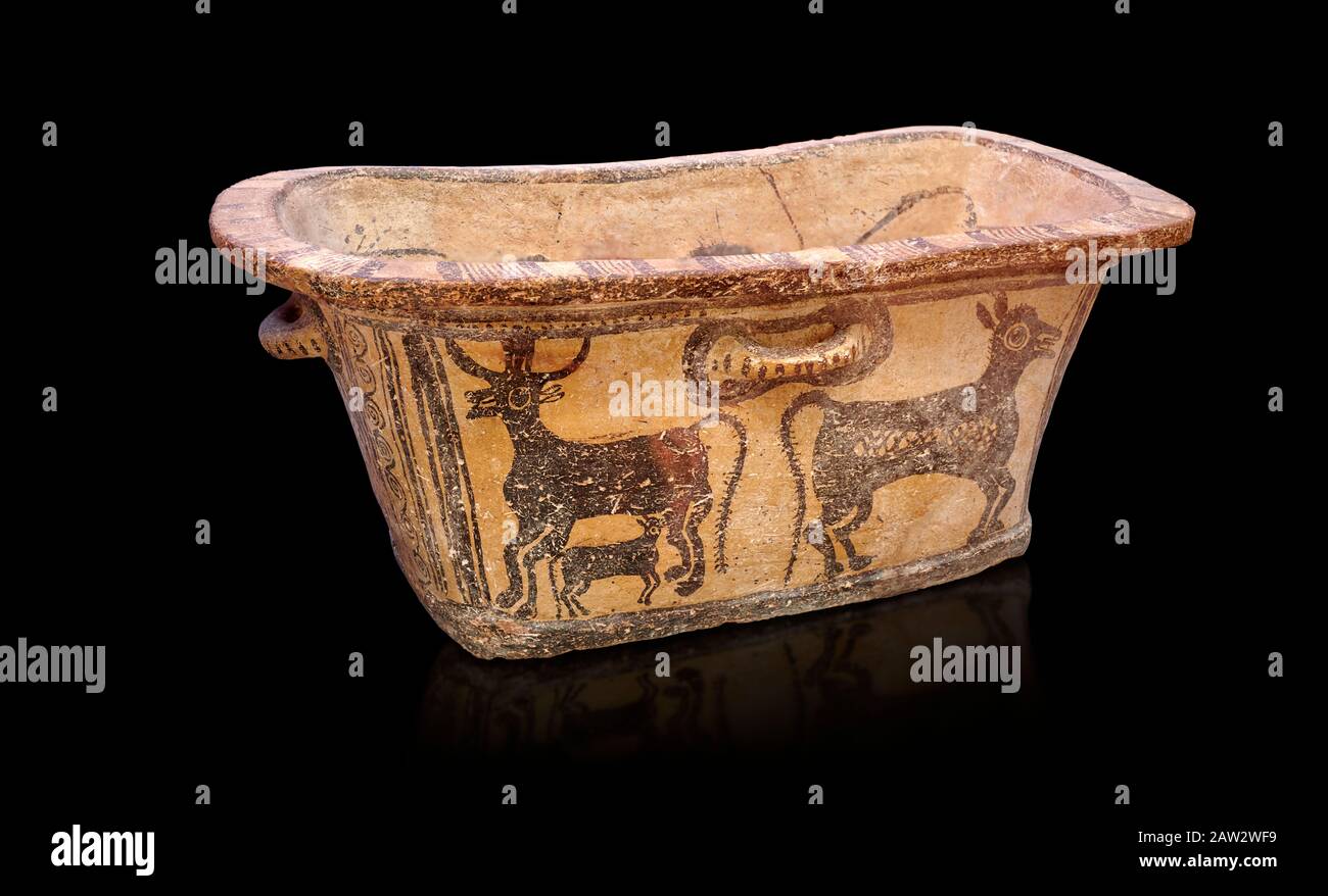 Minoan  pottery bath tub  larnax decorated with a cow nursing a calf,  Episkopi-Lerapetra 1350-1250 BC, Heraklion Archaeological  Museum, black backgr Stock Photo