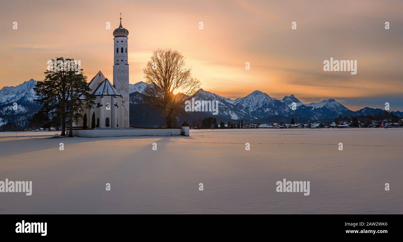 Winter sunset at the Pilgrimage Church of St. Coloman, near Schwangau, Bavaria, Germany. Stock Photo