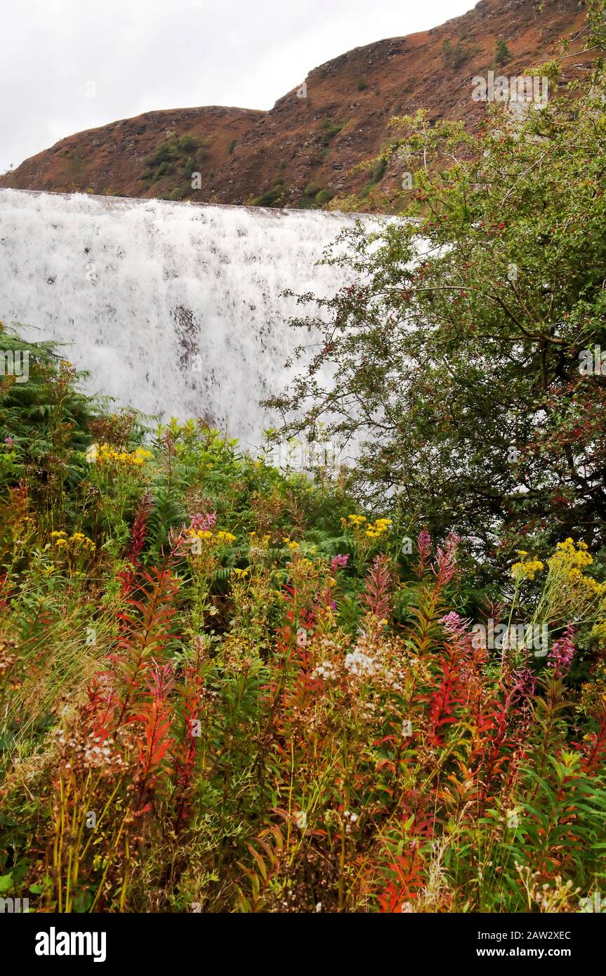 Overflowing dam at the Elan Valley after heavy rainfall. Stock Photo