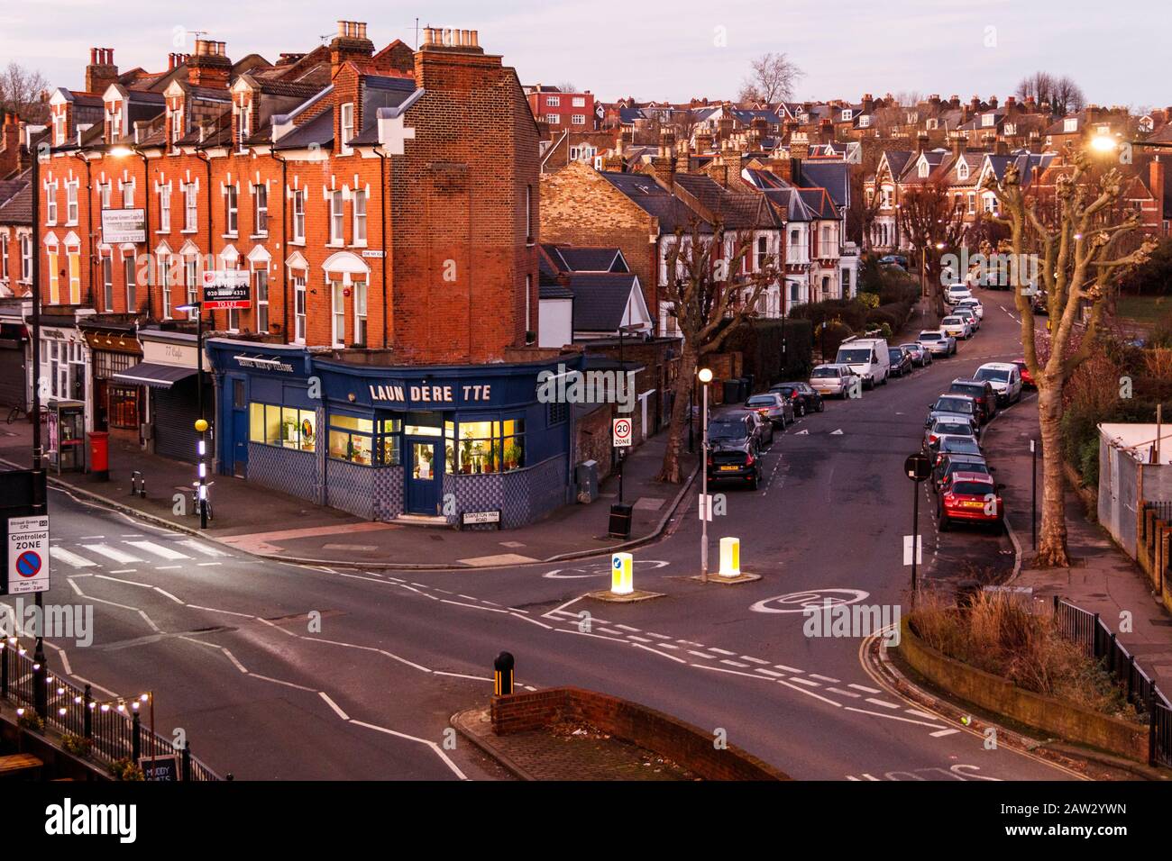 Stapleton Hall Road and Ferme Park Road at sunset, from Parkland Walk