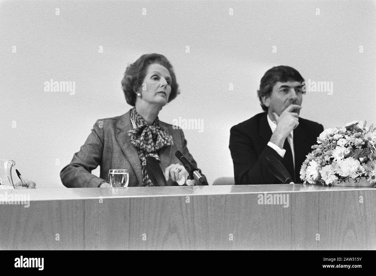 Visiting British Prime Minister Margaret Thatcher  Prime Minister Thatcher (L) and Prime Minister Lubbers during a press conference Date: September 19, 1983 Keywords: Presidents, press conferences Person Name: Lubbers, Ruud, Thatcher, Margaret Stock Photo