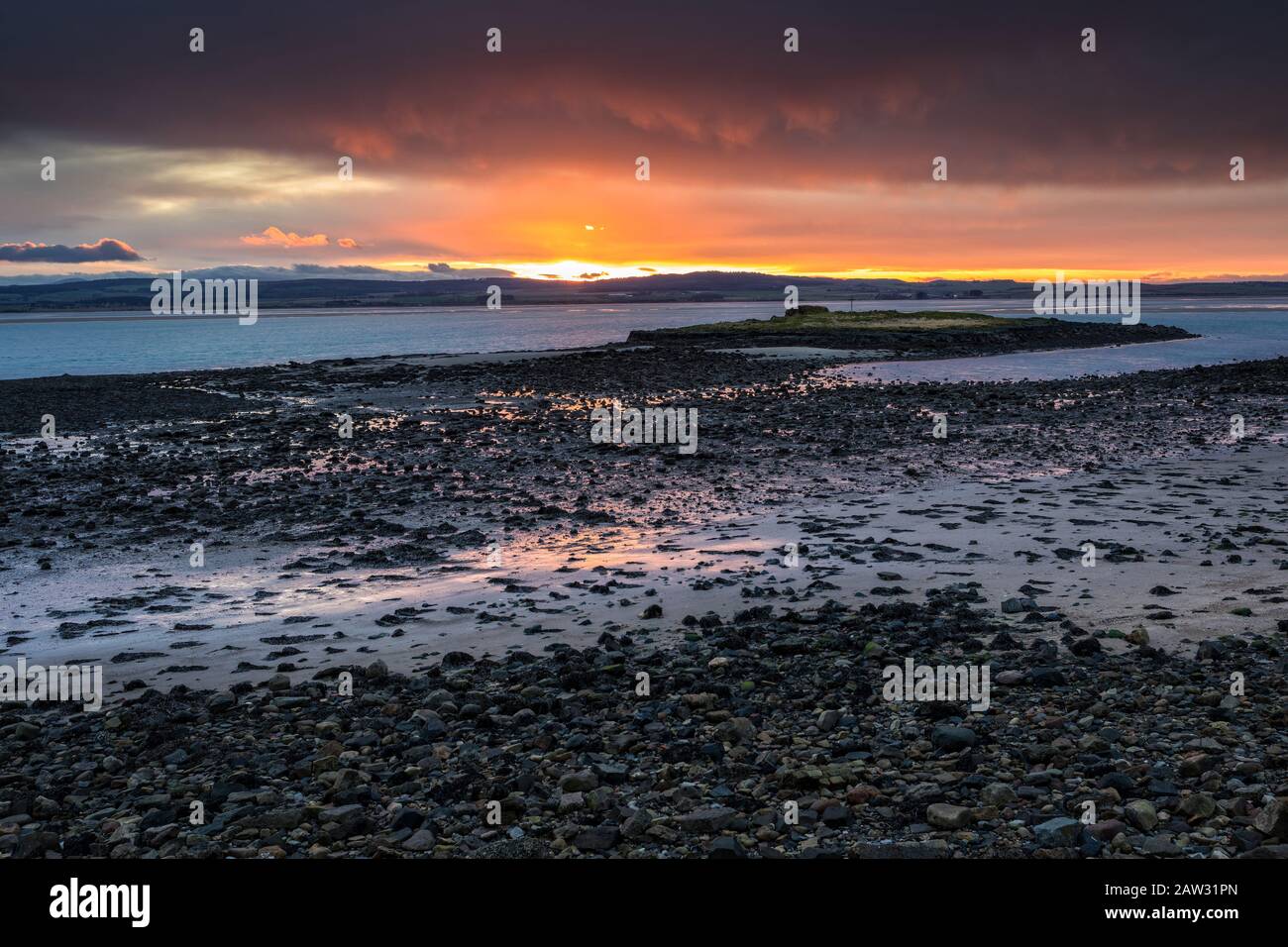 St. Cuthbert's Island, Holy Island at Sunset Stock Photo Alamy