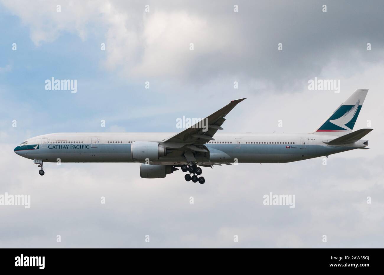Hong Kong, China - February 5, 2020 - Cathay Pacific ariplane ready to land. Cathay Pacific asked workers to take 3 weeks off without pay as the coron Stock Photo