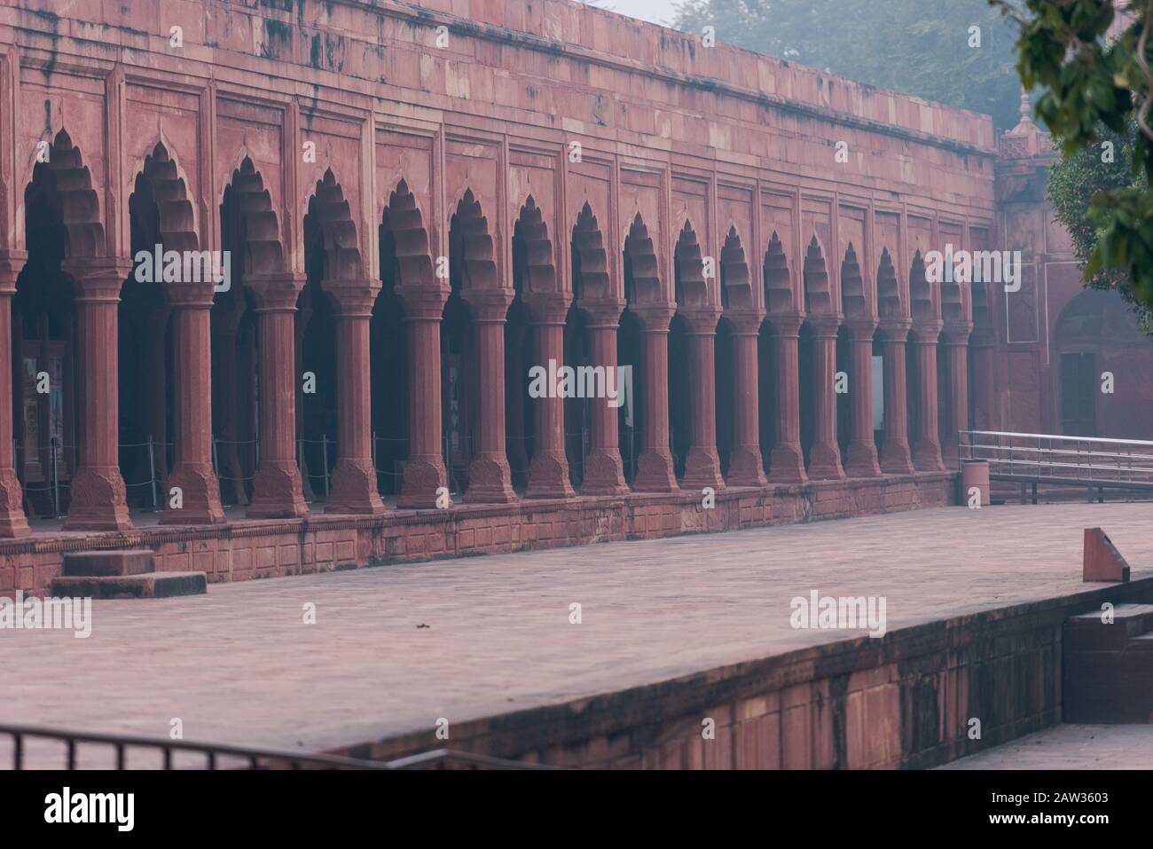 Row of columns inside the Taj Mahal made of red sandstone  in Agra, India Stock Photo